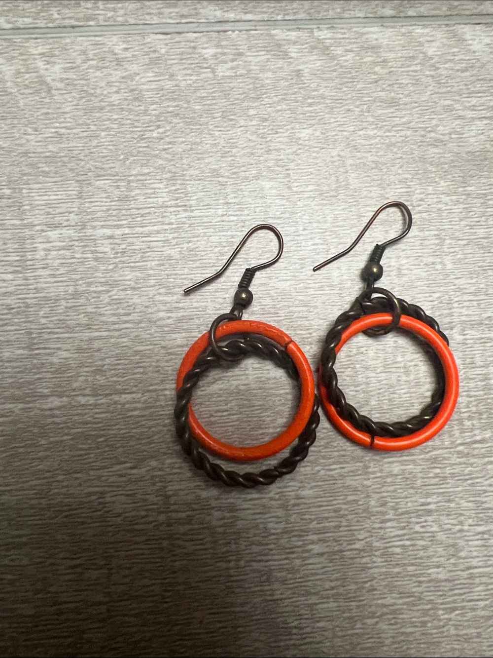 Orange Hoop Drop Earrings with Twisted Metal Accent